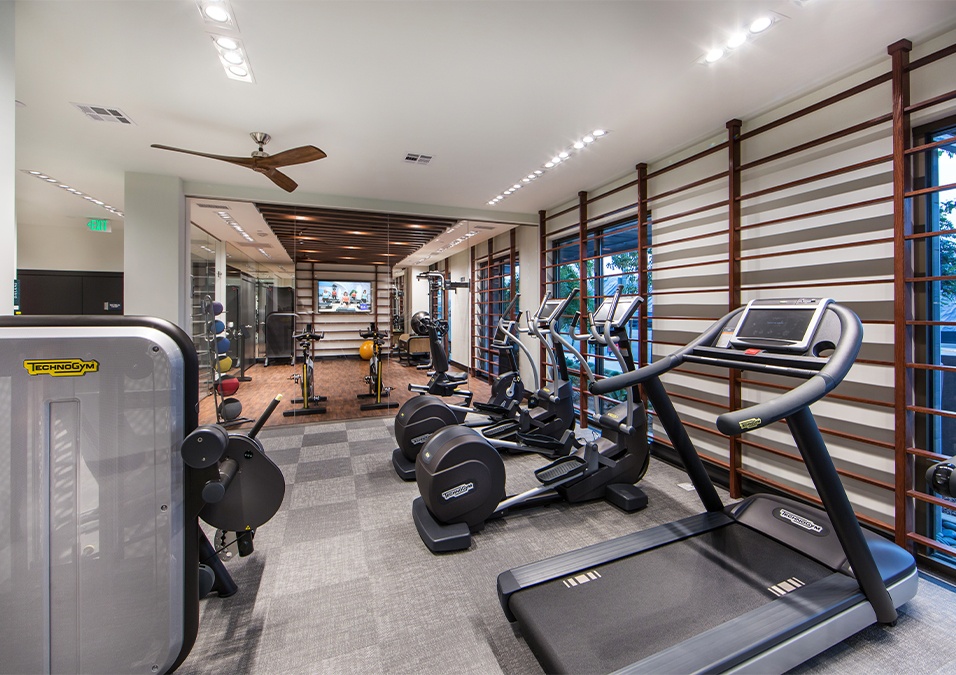 Fitness center with cardio and strength training equipment